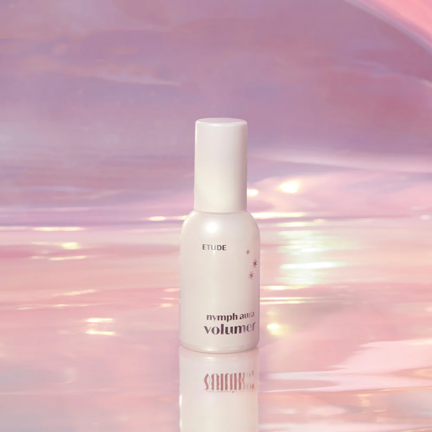 Creamy texture of Etude Nymph Aura Volumer for radiant skin application