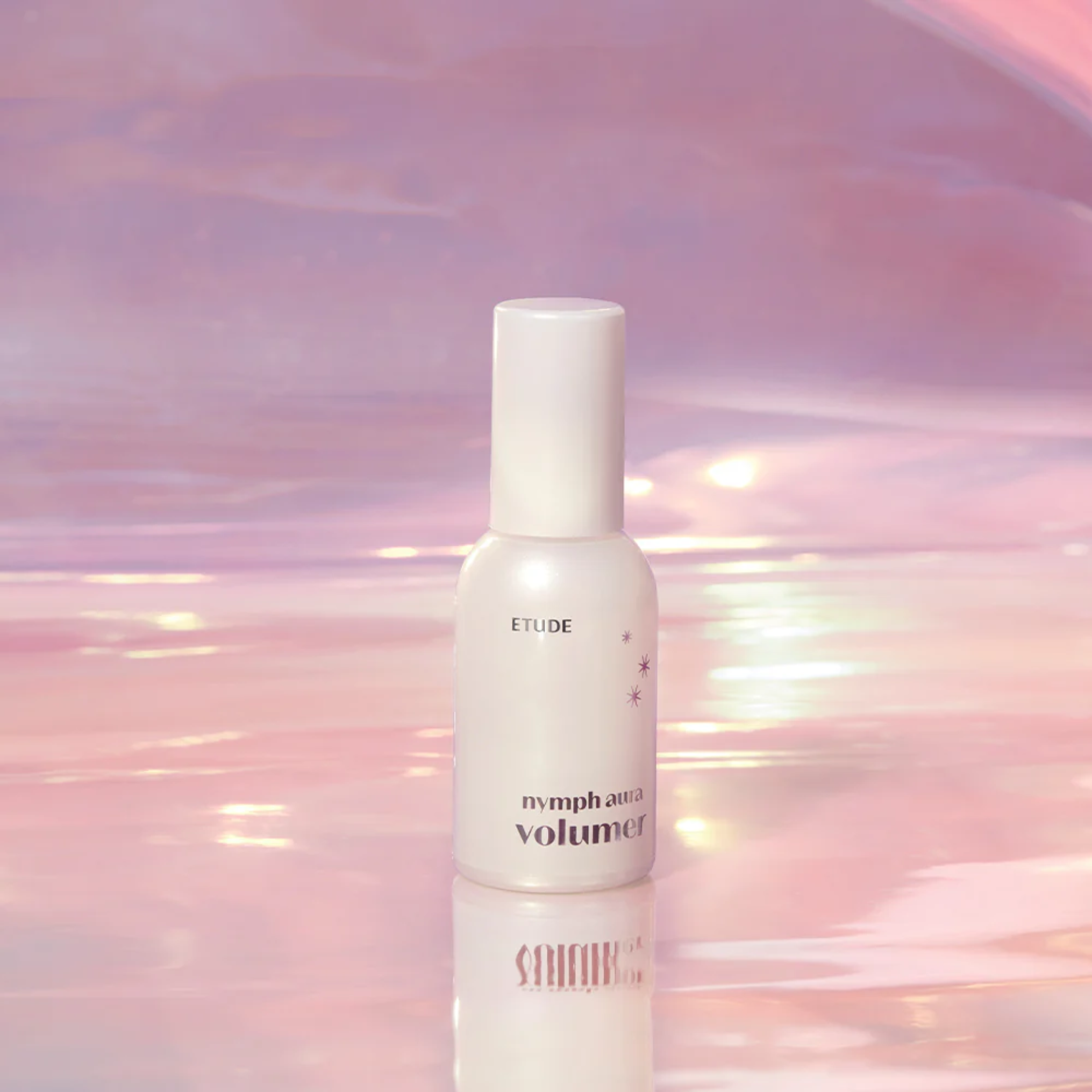 Creamy texture of Etude Nymph Aura Volumer for radiant skin application