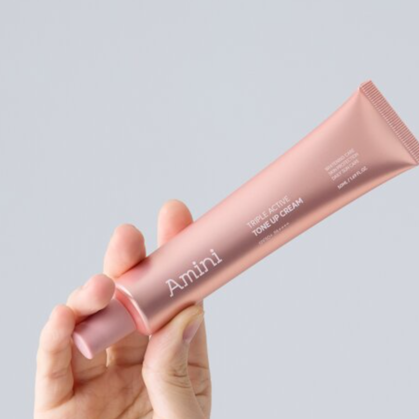 AMINI Triple Tone up Active Sunscreen (50ml) | Brightening & UV Protection